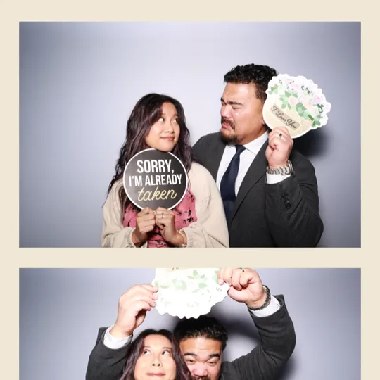 Cynthia and Nathan at their Antiquité wedding reception photo booth